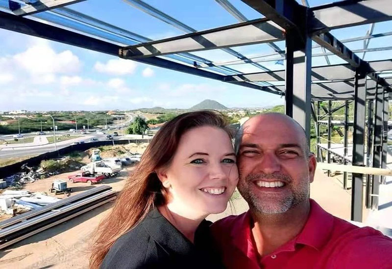 Customer from Aruba was happily installing the building he bought from us with his family