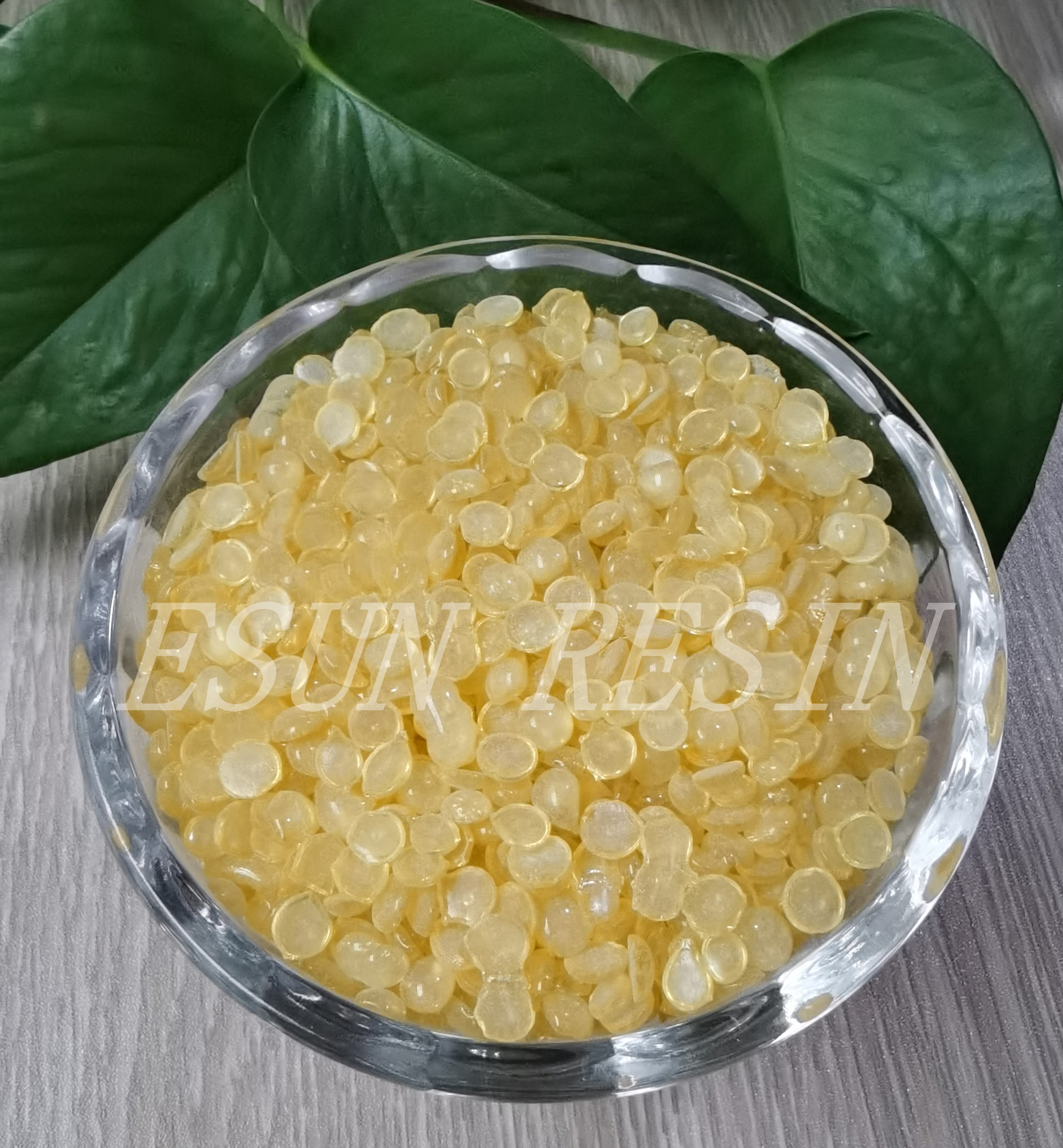 Application de la résine d'hydrocarbure