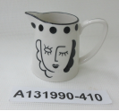 black face design style teapot