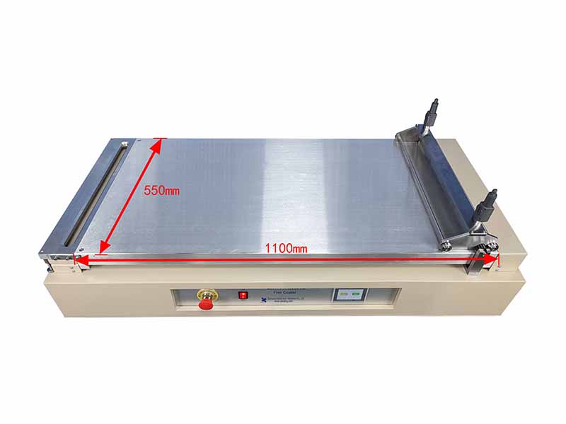 Sheet film coater with vacuum chuck