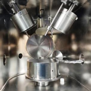 Sistema di rivestimento continuo a sputtering magnetron multicamera