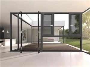 What is the K value for aluminum doors and windows with broken bridges?