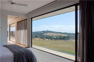 What is a system door and window? Where did it originate?