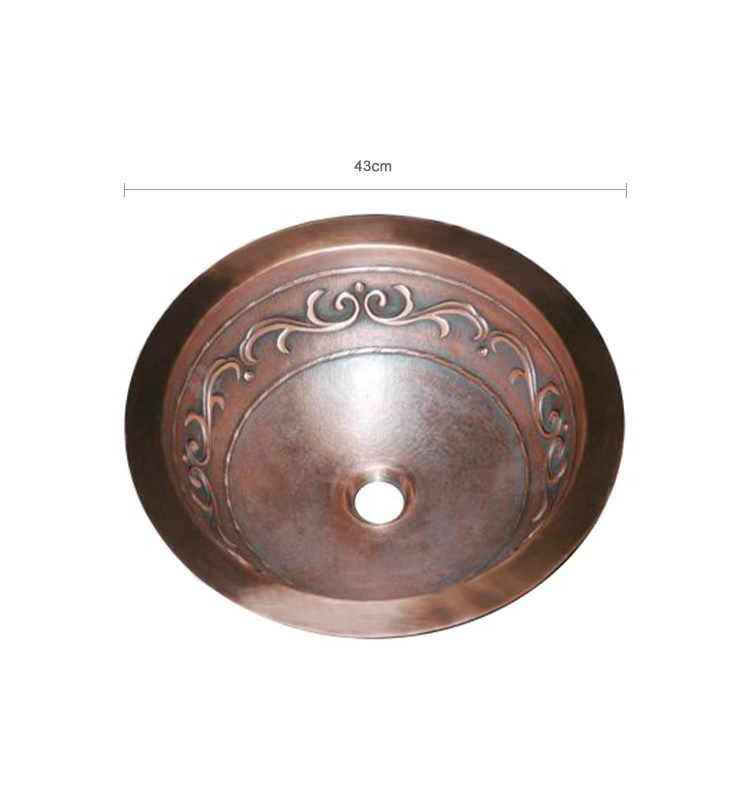 El cobre puro del diseño de lujo martillado debajo del fregadero redondo contrario para el cuarto de baño