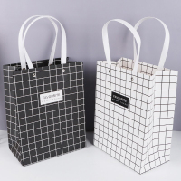 ロープ ハンドルが付いているストライプ ギフト グレー ショッピング ペーパー バッグ