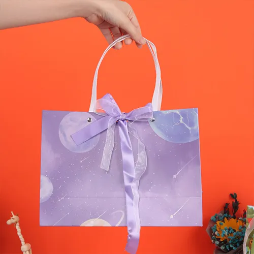 Sacs en papier cadeau pourpre de luxe ruban cravate noeud