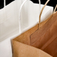 Bolsos de compras blancos grandes reciclables 100% ecológicos del papel de Brown con las manijas