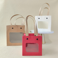 Sacs en papier de cadeau de festival coloré d'artisanat de poignée de rivet avec la fenêtre ouverte