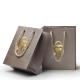 Bolsa de papel de embalaje de regalo de joyería marrón pequeña personalizada con asas retorcidas