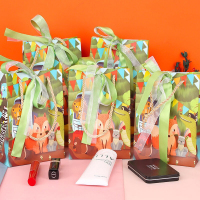 Sac de traitement de papier de goodie de cosmétiques de luxe de vente entière avec l'arc de ruban