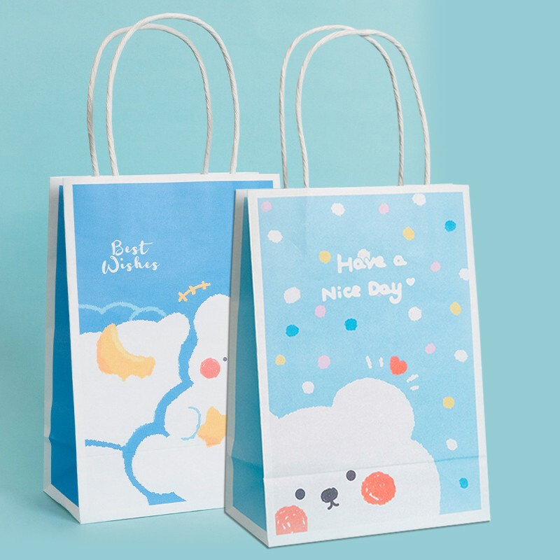 Petit sac de papier cadeau blanc d'emballage d'emballage avec la poignée tordue de papier