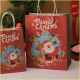 Sacchetto di carta per confezione regalo di Natale con manico in carta ritorta