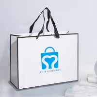 Logotipo personalizado Ropa blanca Zapatos Bolsas de papel con asas de cinta