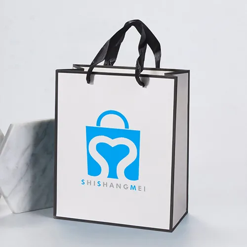 Logotipo personalizado Ropa blanca Zapatos Bolsas de papel con asas de cinta