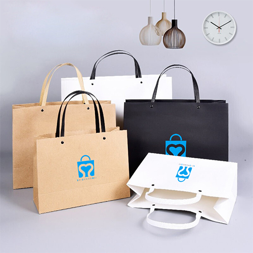 Addensare colore personalizzato negozio di abbigliamento di lusso carta Kraft trasportare borse con manici