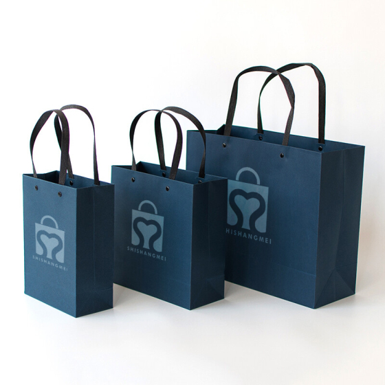 Borse per lo shopping in carta kraft impermeabile all'ingrosso con stampa personalizzata