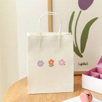 Sacs en papier kraft blancs avec poignées