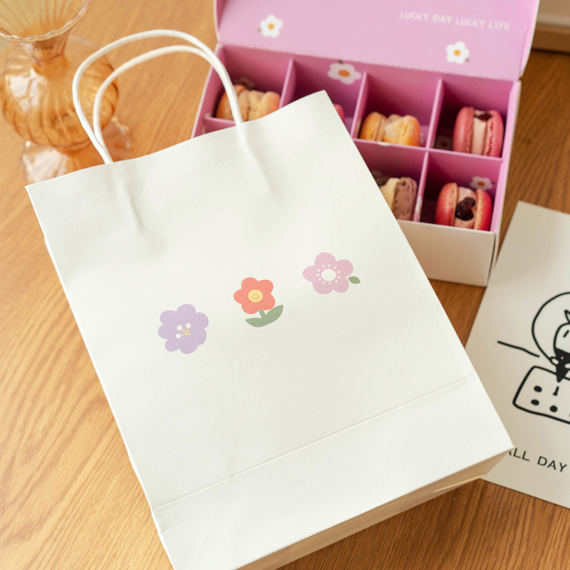 Sacs en papier kraft blancs avec poignées