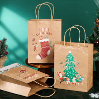 Sacs en papier kraft brun de conception de noël pour des bonbons alimentaires cadeaux