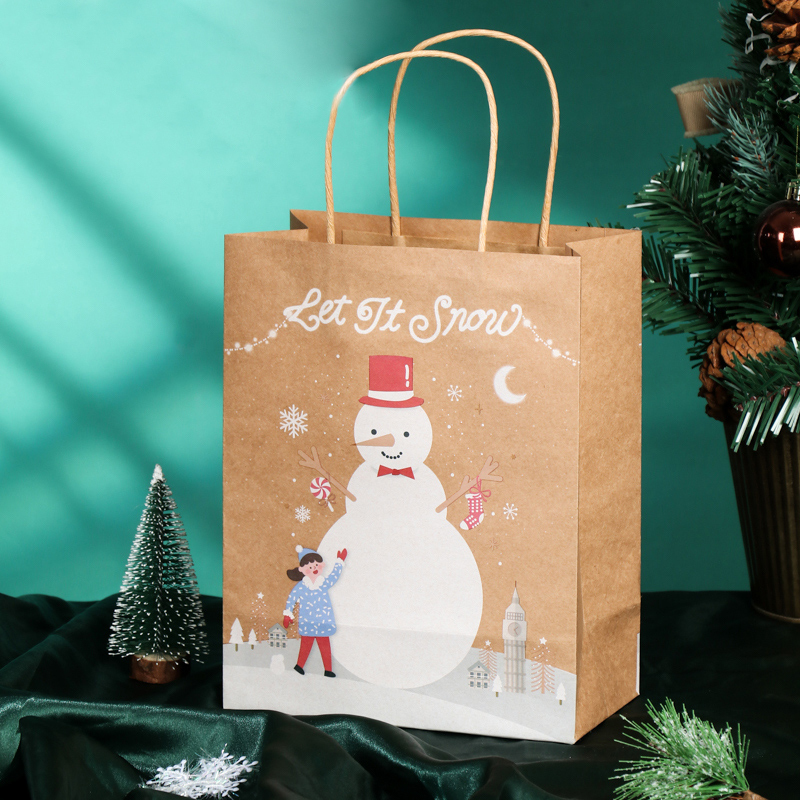 Sacs en papier kraft brun de conception de noël pour des bonbons alimentaires cadeaux