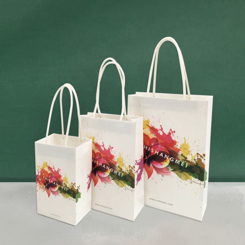 Échantillon gratuit personnalisé cadeau de luxe personnalisé shopping parfum shopper die cut sac en papier emballage cadeau