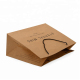 Logo de marque personnalisé Chaussures de vêtements imprimées Emballage Sac de transport en papier kraft brun avec poignées
