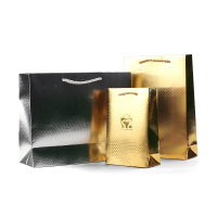 Cadeau de luxe personnalisé vêtements cosmétiques achats spécialité laser sacs en papier gros cadeau premium sac en papier étanche en relief