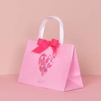 Cadeau de luxe personnalisé vêtements cosmétiques achats spécialité laser sacs en papier gros cadeau premium sac en papier étanche en relief