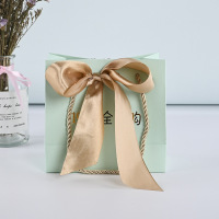 Premium siyah kurdele fiyonklu kağıt hediye poşetleri kendi logonuzla alışveriş çantası