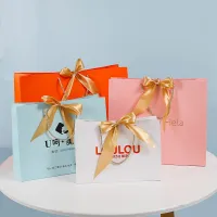 Papier de sacs à provisions de cadeau d'artisanat de couleur de logo imprimé par taille faite sur commande