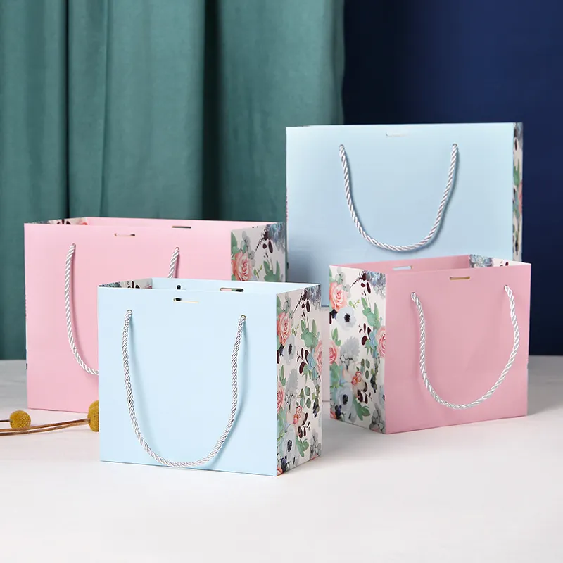 Bolsa de asas europea impresa, embalaje personalizado, bolsa de papel de regalo de compras con lazo de cinta