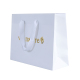 Personalized white paper shopping gift bags with logo and handle for clothes