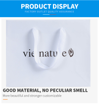 Sacs cadeaux personnalisés en papier blanc avec logo et poignée pour vêtements