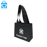 Sacs en papier de conception de luxe personnalisés vêtements bijoux cadeau cosmétique artisanat shopping emballage sac en papier avec poignées en ruban