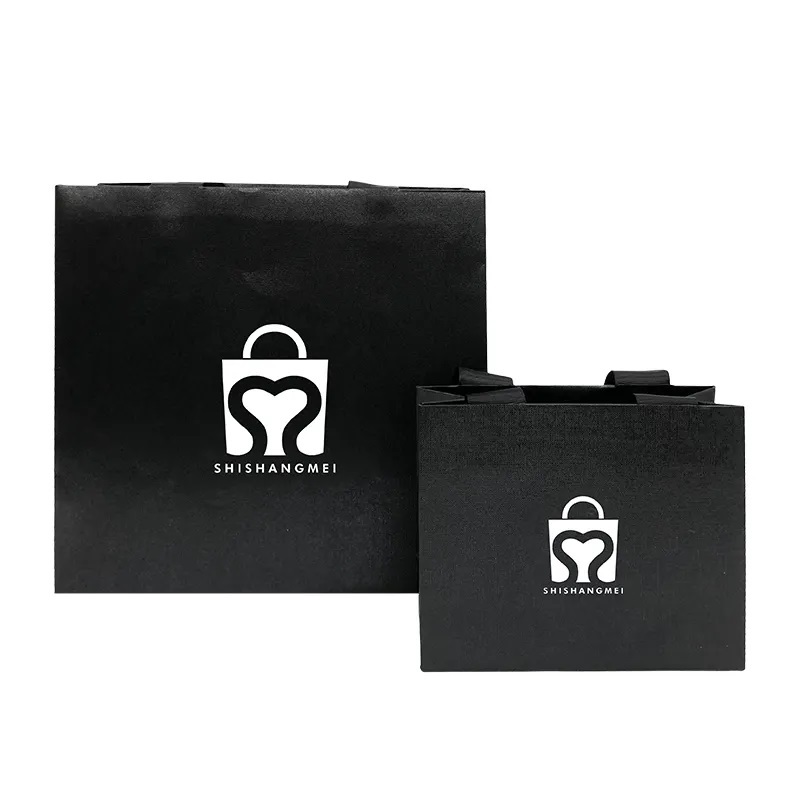 Sacs en papier de conception de luxe personnalisés vêtements bijoux cadeau cosmétique artisanat shopping emballage sac en papier avec poignées en ruban
