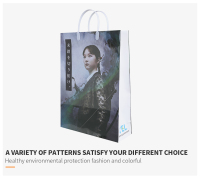 Sac de papier commercial réutilisable de luxe d'impression de film de conception faite sur commande jetable avec le sac de cadeau orange de logo avec la poignée de ruban