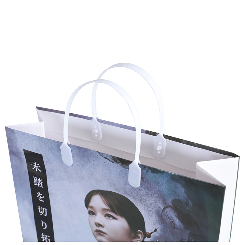 Sac de papier commercial réutilisable de luxe d'impression de film de conception faite sur commande jetable avec le sac de cadeau orange de logo avec la poignée de ruban