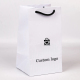 Sac de cadeau biodégradable personnalisé sac en papier de bijoux de luxe blanc à emporter personnalisé avec poignées imprimé logo de marque