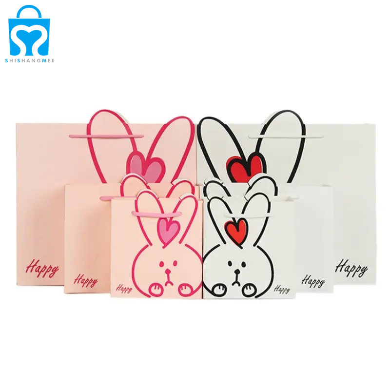 Sac à provisions en papier imprimé de luxe personnalisé mini petit dessin animé cadeau artisanat sac d'emballage au détail avec logo pour l'emballage
