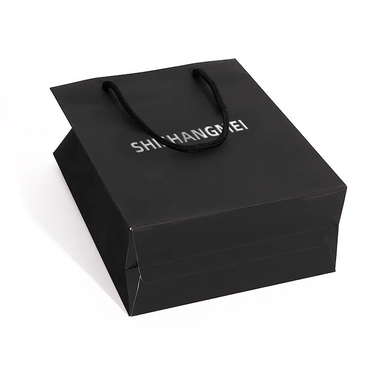 Fabricant personnalisé de sac cadeau de sac à provisions d'emballage de vêtements de petite remise des diplômes avec ses propres sacs en papier d'impression de conception grands pour des cadeaux