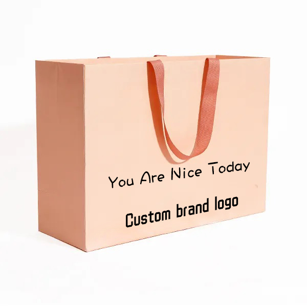 Sac en papier commercial de luxe blanc de haute qualité personnalisé avec emballage de sac cadeau logo avec poignées logo pour vêtements