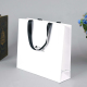 Corde plate semi-automatique blanc marque de luxe ruban poignée boutique artisanat shopping fourre-tout sac en papier sacs d'emballage de cheveux avec logo