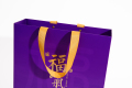 Sacos de compras de papel de presente personalizados roxo camiseta sac cadeaux loja embalagem artesanato arte saco de papel duro com impressão do logotipo