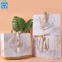 Lüks kozmetik mücevher ambalajı kahverengi kraft el işi kağıdı alışveriş hediye keseleri, özel logolar ile şerit halatlı kağıt torba kolu