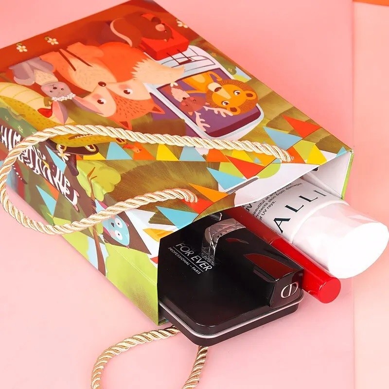 Luxury shopping newest small packing paper bag cute bear cartoon paper with custom logo kids gift package bag manufacturer