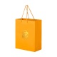 Kleine Industriepreise verdickte Einzelhandels-Kraftpapiertüten für Geschenke mit benutzerdefinierten Logos, die eine orangefarbene Geschenktüte aus Goldfolie stempeln
