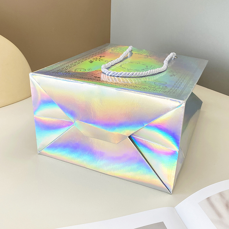 Zanaat altın parlak giyim alışveriş lazer yıkanabilir whater dayanıklı paket servisi olan restoran parlak kuşe kağıt tote çanta kozmetik ayakkabı için