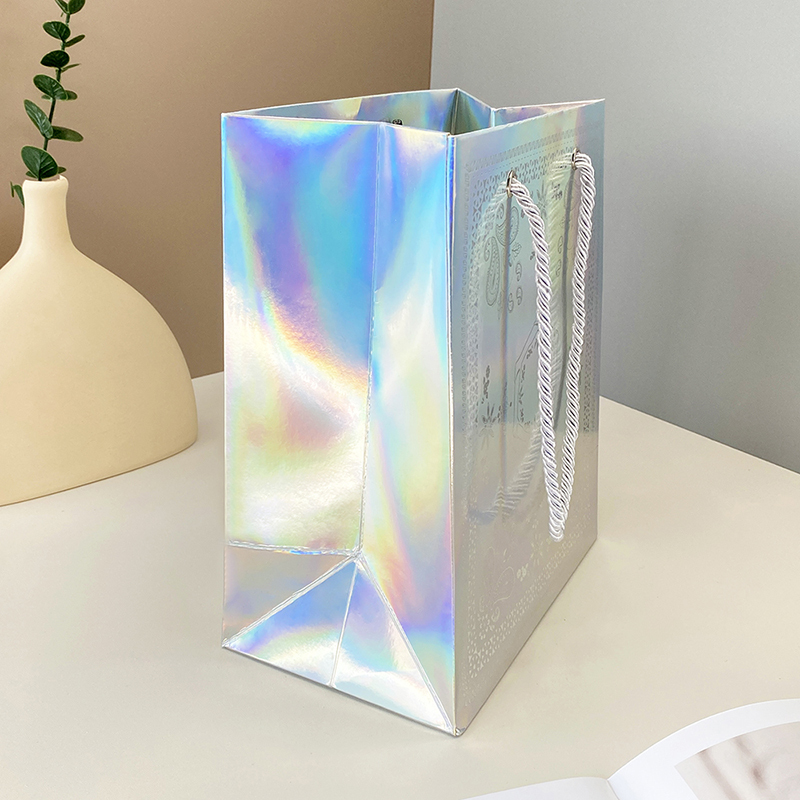 Zanaat altın parlak giyim alışveriş lazer yıkanabilir whater dayanıklı paket servisi olan restoran parlak kuşe kağıt tote çanta kozmetik ayakkabı için