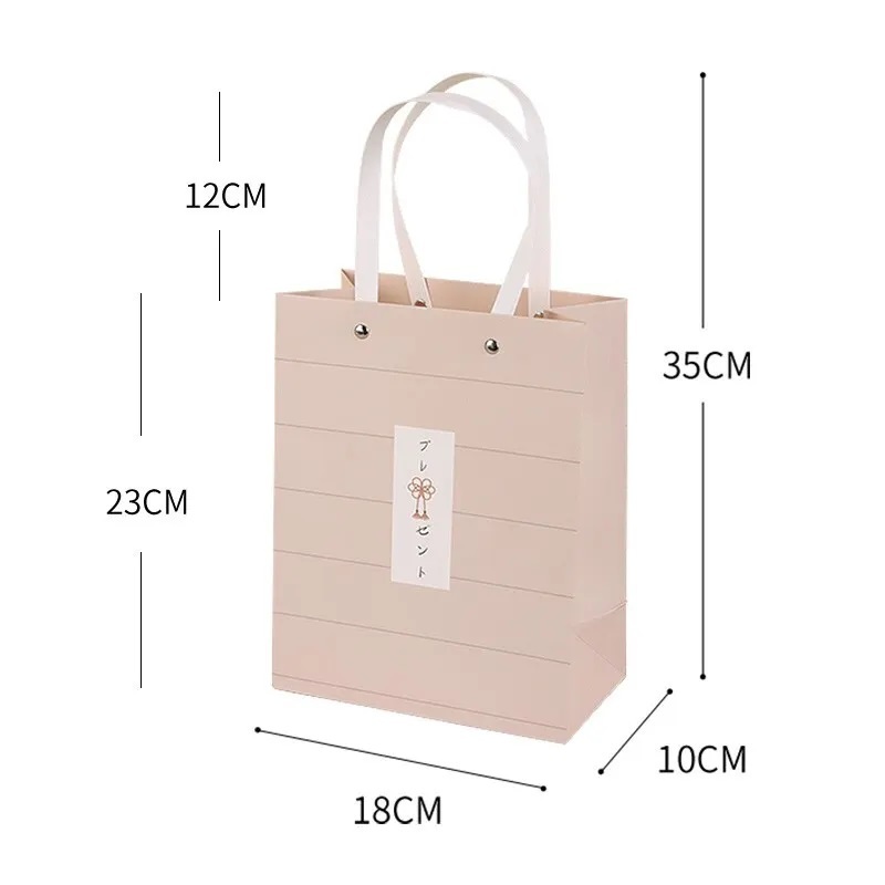 Custom luxury small cartoon bag shopping paper bag with embossed logo jewelry gift packaging bag logo