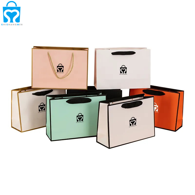 Fantaisie artisanat personnalisé boutique épicerie cadeau papier chaîne mode sac à provisions avec votre propre logo imprimé pour les vêtements